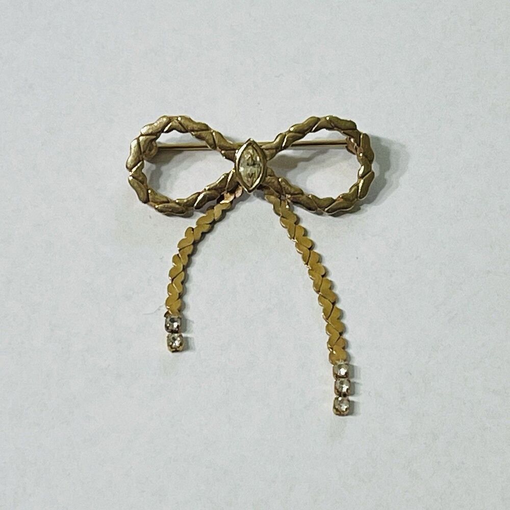Vintage Avon Gold Tone Marquis Cut Rhinestone Bow Dangling Chains Brooch Pin